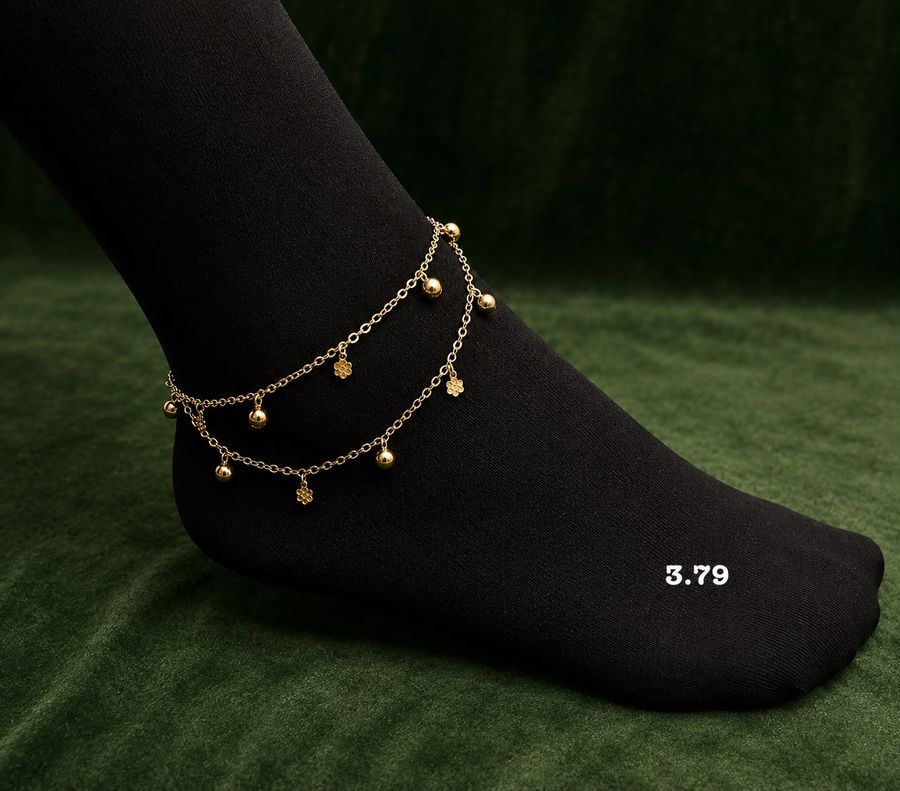 Fine gold double-chain anklet with bead and flower charms